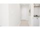 Clean hallway with light walls and carpet flooring at 2404 Adrift Rd, Fuquay Varina, NC 27526