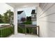 Front porch with wooden railings, offering a welcoming entrance at 2404 Adrift Rd, Fuquay Varina, NC 27526