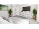 Spacious bedroom with a dresser, TV, and large bed at 2404 Adrift Rd, Fuquay Varina, NC 27526