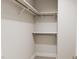 Large walk-in closet with double hanging rods and shelving at 2404 Adrift Rd, Fuquay Varina, NC 27526