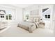 Comfortable bedroom with a cozy bed and plenty of natural light at 2400 Adrift Rd, Fuquay Varina, NC 27526