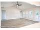 Spacious living room with high ceilings, a ceiling fan, and a view of the backyard at Tbd 1 Cedar Lane Rd, Sanford, NC 27332