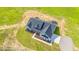 Aerial view of a single-story farmhouse on a large grassy lot at Tbd 1 Cedar Lane Rd, Sanford, NC 27332