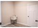 Laundry room with utility sink and built-in storage at Tbd 1 Cedar Lane Rd, Sanford, NC 27332
