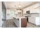 Spacious kitchen with white cabinets, a large island, and modern appliances at Tbd 1 Cedar Lane Rd, Sanford, NC 27332
