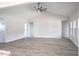 Open living room with high ceilings, a ceiling fan, and plenty of natural light at Tbd 1 Cedar Lane Rd, Sanford, NC 27332