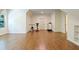 Home gym with hardwood floors and exercise equipment at 1217 Mauldin Cir, Wake Forest, NC 27587