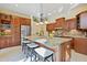 Gourmet kitchen with granite countertops and stainless steel appliances at 1217 Mauldin Cir, Wake Forest, NC 27587