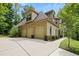 Three-car garage with concrete driveway at 1217 Mauldin Cir, Wake Forest, NC 27587