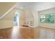 Charming bedroom with hardwood floors, built-in shelves, and window seat at 1217 Mauldin Cir, Wake Forest, NC 27587