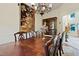 Elegant dining room with rich wood table and chairs at 1217 Mauldin Cir, Wake Forest, NC 27587