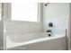 Relaxing bathroom with soaking tub and subway tile surround at Tbd 2 Cedar Lane Rd, Sanford, NC 27332