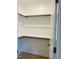 Spacious walk-in closet with hanging rods and shelving at 119 Seahawk Way, Zebulon, NC 27597