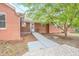 Brick house with ramp access and landscaping at 2171 Bud Lipscomb Rd, Willow Springs, NC 27592