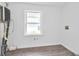 Laundry room with window and vinyl flooring at 2171 Bud Lipscomb Rd, Willow Springs, NC 27592