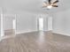 Spacious main bedroom with hardwood floors and ceiling fan at 2171 Bud Lipscomb Rd, Willow Springs, NC 27592