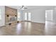 Living room with hardwood floors, fireplace, and French doors at 2171 Bud Lipscomb Rd, Willow Springs, NC 27592