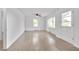 Living room with hardwood floors and access to backyard at 2171 Bud Lipscomb Rd, Willow Springs, NC 27592