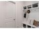 White mudroom with built-in bench and storage at 738 Apple Churn Dr, Fuquay Varina, NC 27526