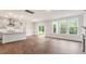 Open concept kitchen with island and hardwood floors at 260 Umstead St, Sanford, NC 27330