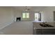 Open living room, kitchen, and fireplace at 139 Grace Ridge Ct, Benson, NC 27504