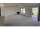 Spacious living room with a fireplace and access to porch at 139 Grace Ridge Ct, Benson, NC 27504