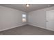 Spacious bedroom with neutral walls and carpet at 324 Bishop Ln, Sanford, NC 27330