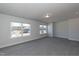 Bright bedroom with two windows and carpet at 324 Bishop Ln, Sanford, NC 27330