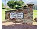 Stone sign marking the entrance to East Clayton Dog Park at 27 Pansy Park # 230, Clayton, NC 27520