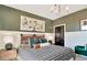 Modern bedroom with stylish decor and a green accent wall at 1306 Alston Landing Way Rd # 12, Cary, NC 27519