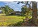 Back of house with large backyard and fenced area at 2063 Knight St, Creedmoor, NC 27522