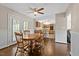 Dining room with hardwood floors and kitchen view at 2063 Knight St, Creedmoor, NC 27522