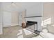Cozy Gathering room featuring a brick fireplace and built-in shelving at 2063 Knight St, Creedmoor, NC 27522