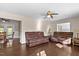 Living room with hardwood floors and view into dining area at 2063 Knight St, Creedmoor, NC 27522