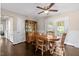 Bright dining room with hardwood floors and wood table set at 2063 Knight St, Creedmoor, NC 27522