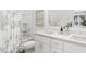 Modern bathroom with double vanity and shower/tub combo at 2413 Adrift Rd, Fuquay Varina, NC 27526