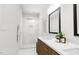 Clean bathroom with double vanity, walk-in shower and stylish fixtures at 2413 Adrift Rd, Fuquay Varina, NC 27526
