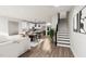 Open concept kitchen with modern appliances and an island with seating at 2413 Adrift Rd, Fuquay Varina, NC 27526