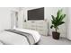 Serene bedroom with a large dresser and stylish decor at 2413 Adrift Rd, Fuquay Varina, NC 27526