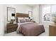Spacious bedroom with wood accents and large windows at 2413 Adrift Rd, Fuquay Varina, NC 27526