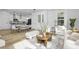 Open concept kitchen and dining area with modern appliances and an island at 2411 Adrift Rd, Fuquay Varina, NC 27526