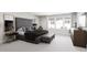 Spacious primary bedroom with large windows and plush bedding at 2415 Adrift Rd, Fuquay Varina, NC 27526
