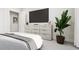 Stylish bedroom with a large bed and a media console at 2415 Adrift Rd, Fuquay Varina, NC 27526