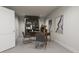 Bright home office features a large desk and built-in shelving at 2415 Adrift Rd, Fuquay Varina, NC 27526