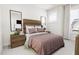Cozy bedroom with a queen-size bed and wooden nightstands at 2415 Adrift Rd, Fuquay Varina, NC 27526