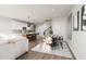 Open concept dining area with a kitchen and living room view at 2415 Adrift Rd, Fuquay Varina, NC 27526