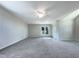 Large bedroom featuring carpet flooring and a ceiling fan at 27 Pine Croft Rd, Angier, NC 27501