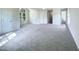 Bright main bedroom with large window and ensuite bathroom access at 27 Pine Croft Rd, Angier, NC 27501