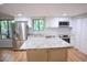 Updated kitchen with stainless steel appliances and granite countertops at 3404 Gemini Dr, Raleigh, NC 27604