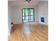 Bright living room with hardwood floors and fireplace at 3404 Gemini Dr, Raleigh, NC 27604
